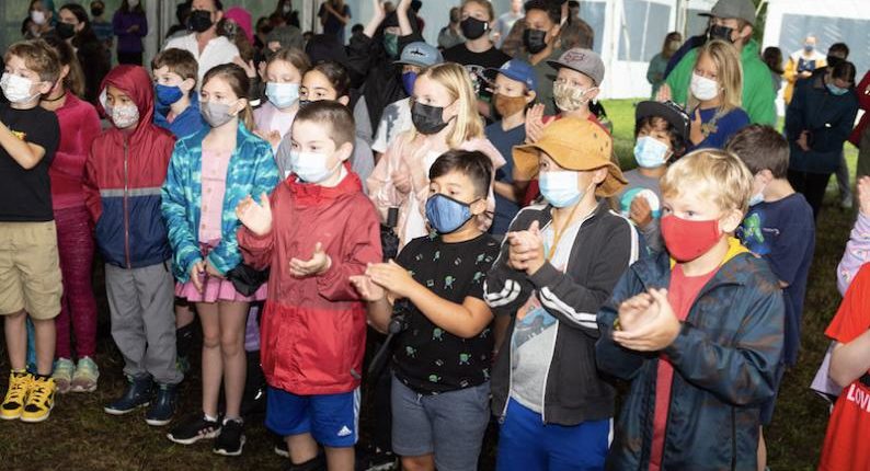 Students and alumni joined together Friday to celebrate the school's 25th anniversary.