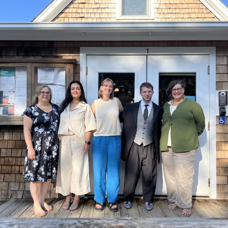 Five staff members standing in front of the school: Mandy Tomkins, Brumelha Magri, Meaghan Lynch, Chris Nace, Dani Charbonneau